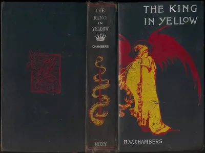 This is a photograph of a book cover showing both the front and back of a hardcover edition of The King in Yellow by R.W. Chambers, published by Neely. The front cover features a yellow-robed figure with large red wings against a black background, while the spine shows a caduceus-like serpent design and a crown symbol, and the back cover displays a red decorative rectangular emblem with foliage motifs.